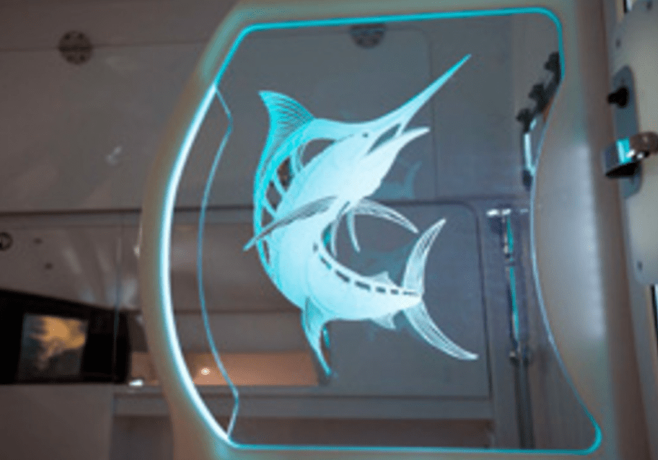 A glass sculpture of two fish in the shape of a circle.