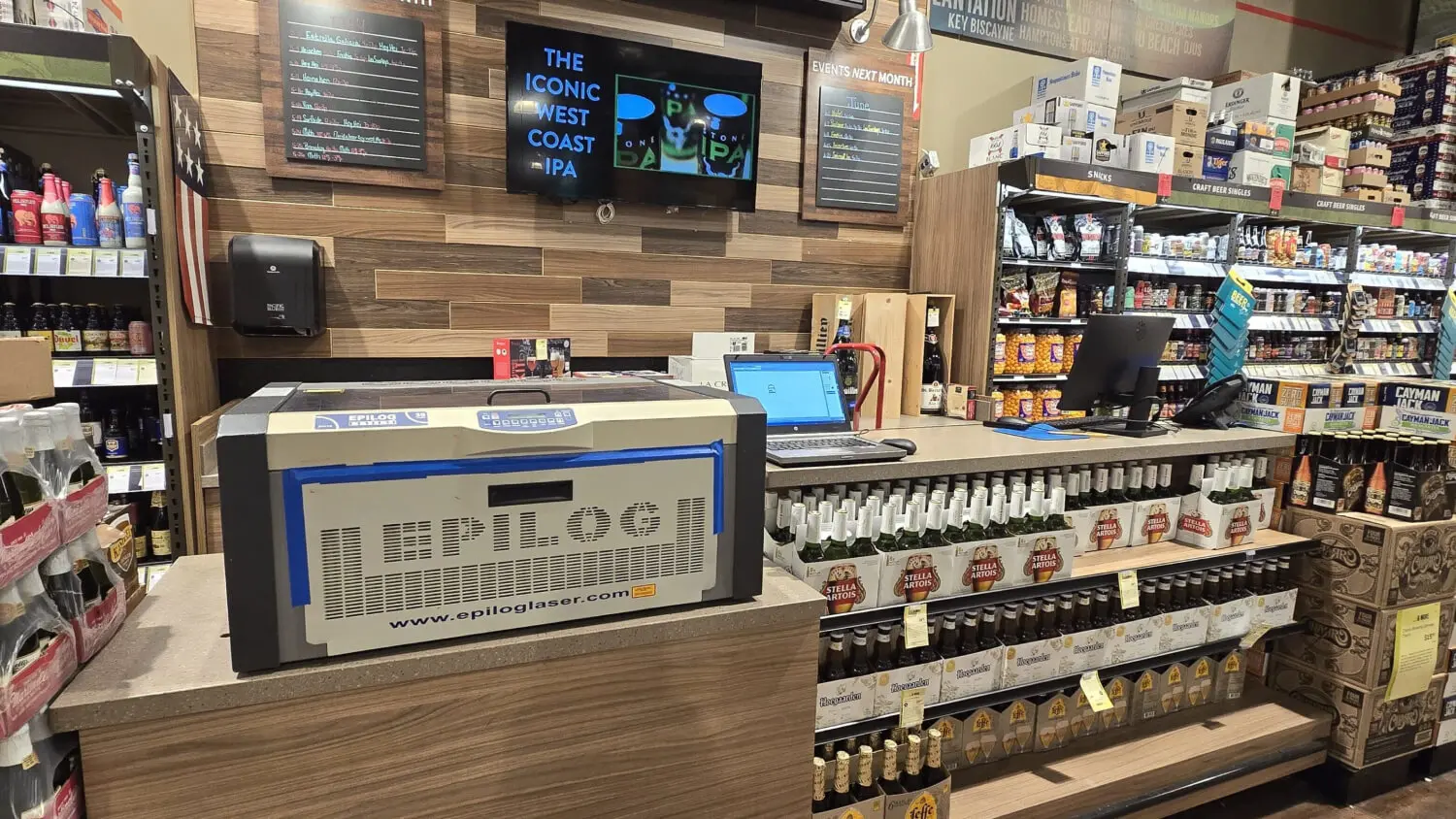 A bar with many bottles of beer on the counter